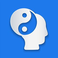 Paper cut Yin Yang symbol of harmony and balance icon isolated on blue background. Paper art style. Vector