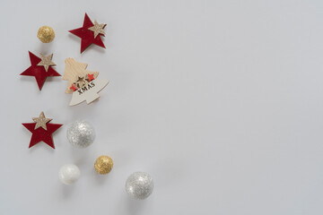 Christmas composition.Tree branches, red decorations on white background.