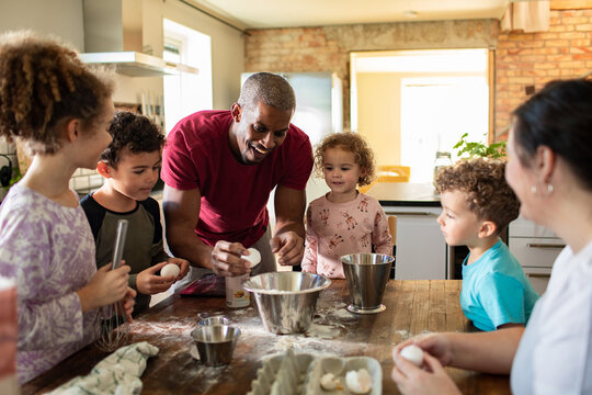 Family Baking Together in a Cozy Kitchen