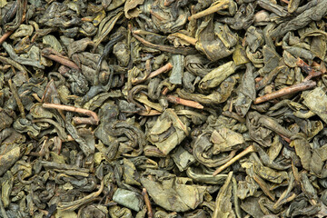 macro of dry green tea leaves