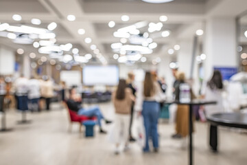 Blurred image of shopping mall and bokeh for background usage.