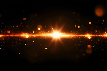 Golden lens flare with light particles on a black background