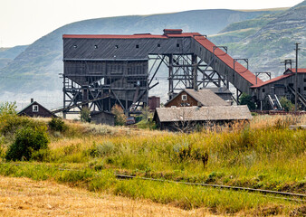 Fototapeta na wymiar Bridge, buildings and area of the National Historic Site Atlas Coal Mine, Alberta, Canada