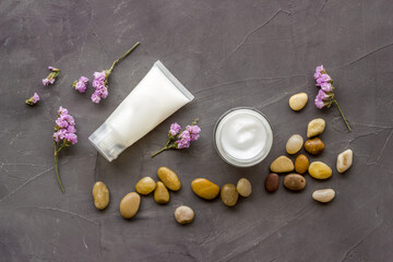 Flat lay of face skin care products - cosmetic cream for face or body