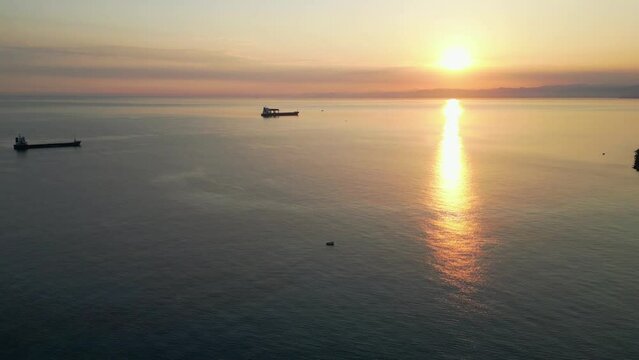 Bay with ships and tankers, view from a drone.