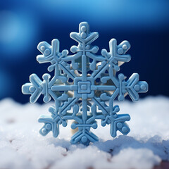 Snowflake from a constructor on a blue background