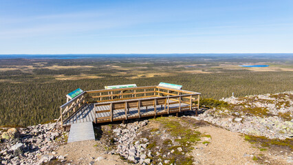 View point on Ukko-Luosto mountain with a great view over the wilderness of Lapland in Finland