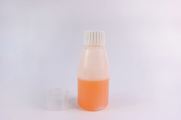 Medicinal syrup and a vessel with liquid volume divisions. Treatment and prevention of diseases. Strengthening immunity.