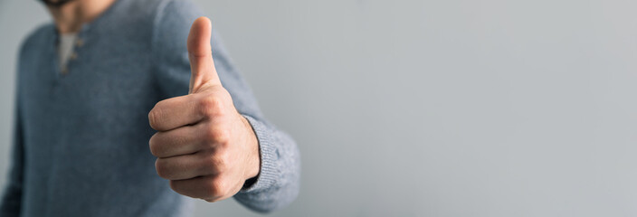 Business man showing thumbs