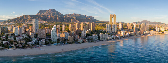 Aerial drone photo of the skyline of the coastal town named Benidorm in the Costa Blanca, Spain - obrazy, fototapety, plakaty