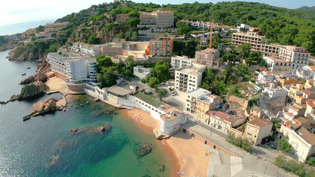  Sant Feliu de Guixols in costa brava aerial views spanish turistic touwn with the mediterranean sea blue transparent 