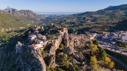 Obraz premium Aerial drone photo of the mountain village named Guadalest in the province of Alicante, Spain