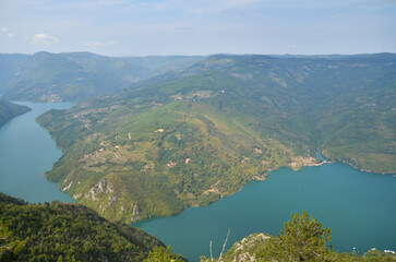 Fototapeta na wymiar view on mountain lake in front of mountain range, national park