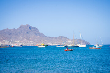 Landscape View of Laginha beach and small boat in Mindelo city in Sao Vicente Island in Cape Verde