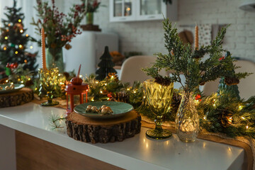 Kitchen interior with a table set in a Christmas atmosphere