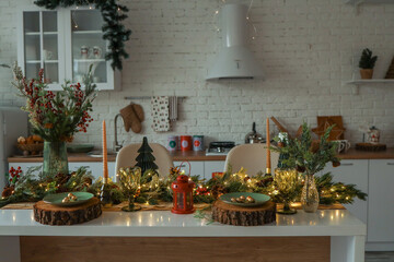 Kitchen interior with a table set in a Christmas atmosphere