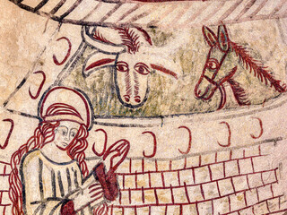 Virgin Mary in the stable with the donkey and an ox