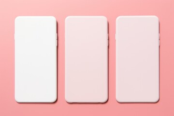 An array of three white silicone phone cases against a soft pink backdrop, exuding minimalist chic