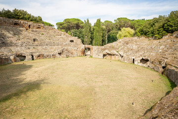 arena of the Roman amphitheatre excavated in the tuff rock in Sutri, province of Viterbo, Lazio,...