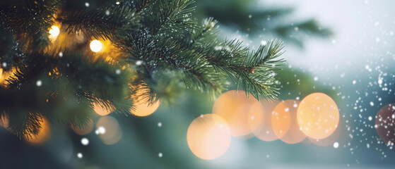 Christmas background with bokeh defocused lights and fir tree branches.