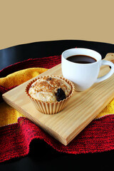 Coffee and muffin. Breakfast with cupcake and coffe.