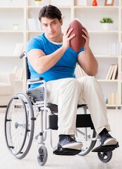 Young man american football player recovering on wheelchair