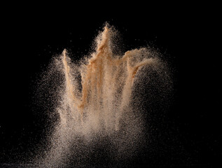 Natural Sand flying explosion, particle dot grain wave explode. Abstract cloud fly. Brown colored...