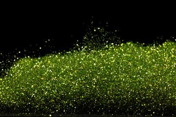 Explosion metallic green glitter sparkle. Green Glitter powder spark blink celebrate, blur foil...