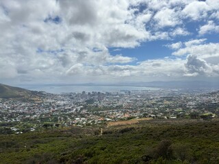 Cape Town, capturing its iconic mountains, coastline, and vibrant city life