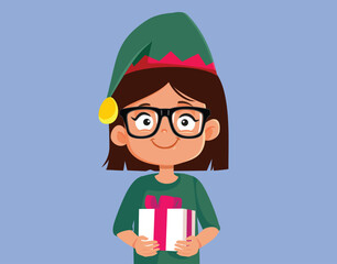 Vector Girl Wearing an Elf Hat Holding a Christmas Present. Cheerful child holding a present from Santa Claus 
