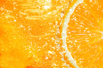 lemon orange slice drop on water soda
