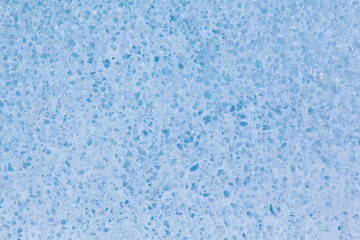 Texture of winter ice surface. Blue natural ice background