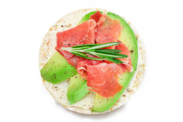 Rice Cake Sandwich with Fresh Avocado, Jamon and Rosemary - Isolated on White. Easy Breakfast. Diet Food. Quick and Healthy Sandwiches. Crispbread with Tasty Filling. Healthy Dietary Snack - Isolation