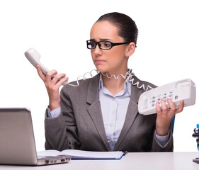 Young businesswoman in office isolated on white