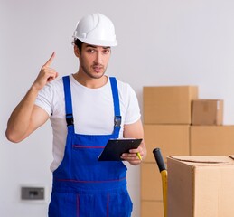 Young male professional mover doing home relocation