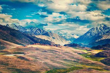 Vintage retro effect filtered hipster style image of small mountain lake in Himalayas. Spiti...
