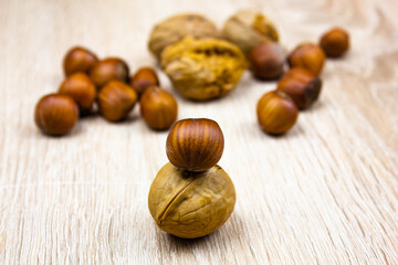 Nuts on the table. Walnut and hazelnut. Natural nuts.