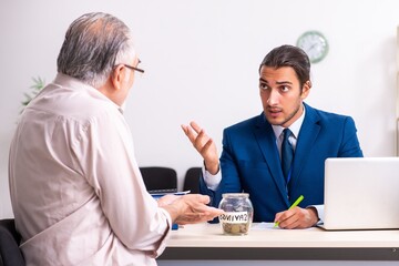 Financial advisor giving retirement advice to old man