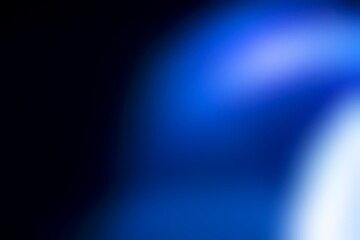 Abstract blurred background image of blue color gradient used as an illustration. Designing posters or advertisements.