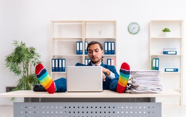 Young male businessman working in the office