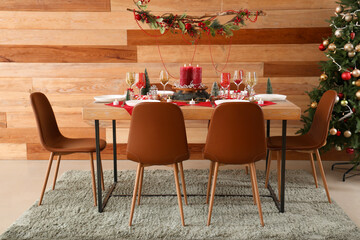 Festive dining table with Christmas setting and beads in room