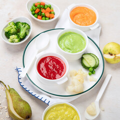 Baby food. Colorful vegetable and fruit puree.