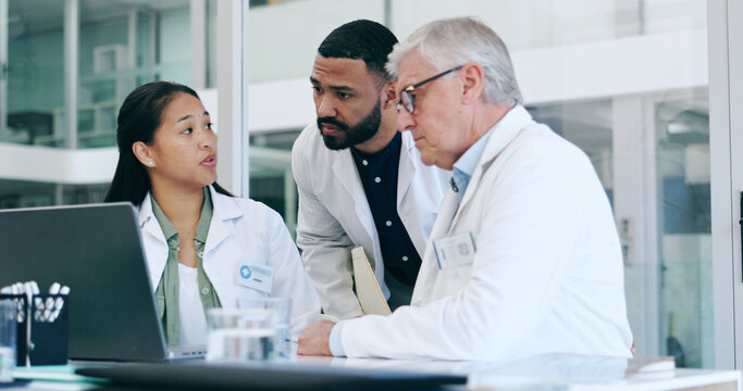 Doctors, medical teamwork and laptop for meeting, planning and solution in hospital or clinic management. Senior expert, healthcare people or group talking, problem solving and support on a computer