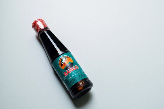 View of the bango kecap manis. It is indonesian brand retail product. It is sweet soy sauce on pladtic bottle on the white background. Bekasi, Indonesia, November 18, 2023
