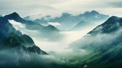 A mountain range shrouded in mist, creating an ethereal landscape,