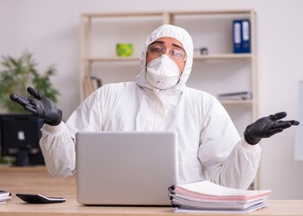 Fototapeta na wymiar Office worker working in quarantine self-isolation
