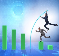 Businessman vault jumping over bar charts