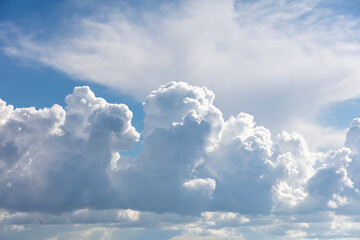 White clouds on a blue sky as a background