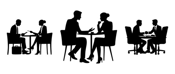 Silhouettes of Business Professionals Engaging in Discussion and One-on-One Meetings in an Office Environment
