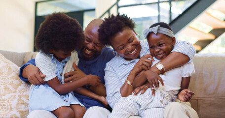 Happy, black family and hug with love on sofa with children and parents together laughing in home....